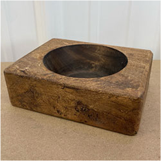 Brown wooden cheese mold